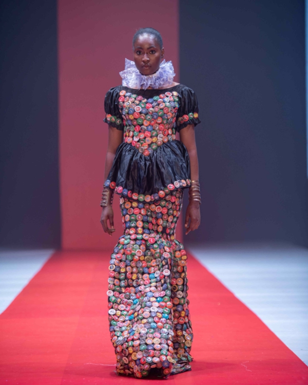 Model wearing outfit made from recycled materials on the Runway during the Africa Fashion Week London (Photo AFWL)